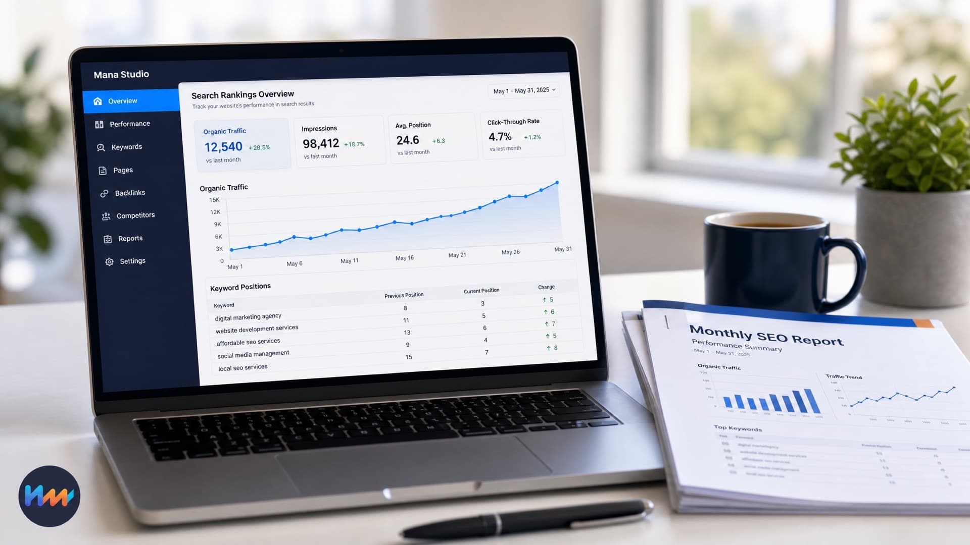 A laptop showing an SEO dashboard with a rising organic traffic graph, next to a printed monthly SEO report