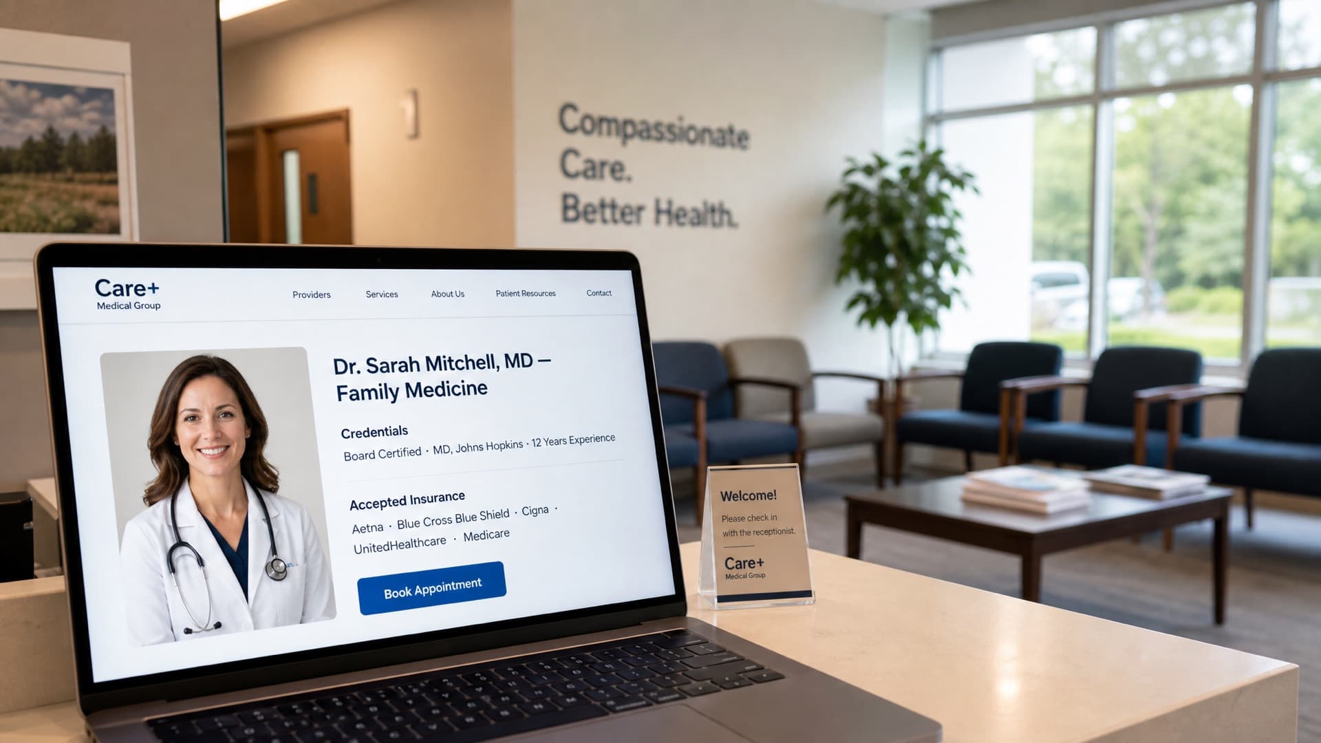 A laptop showing a doctor's provider profile page with credentials and accepted insurance, in a clinic waiting room